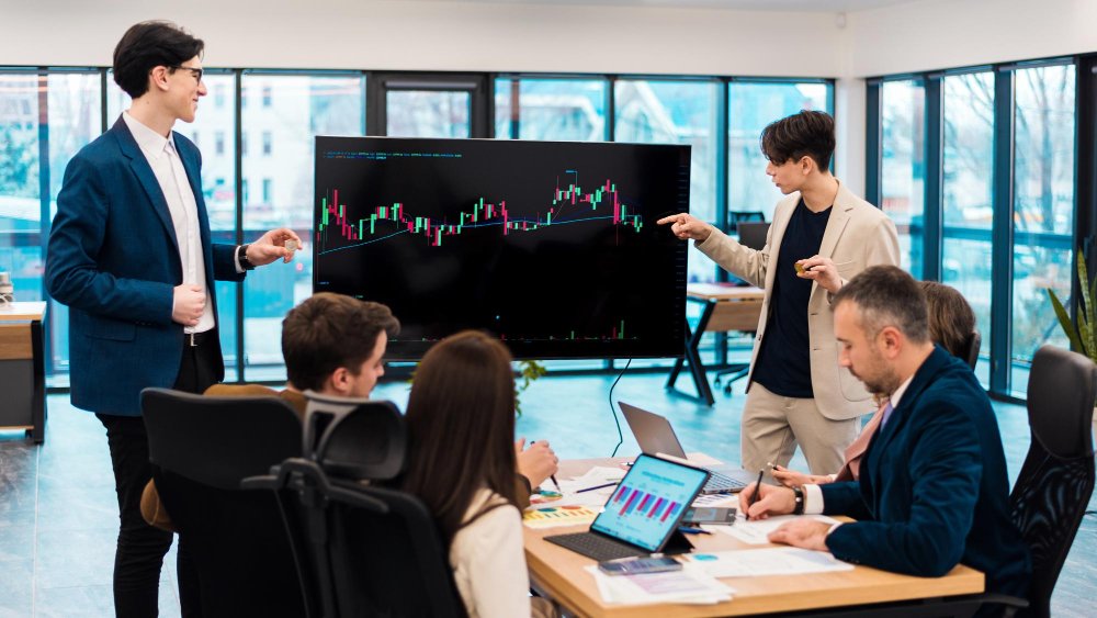 Falcon Diamond trading team reviewing market data