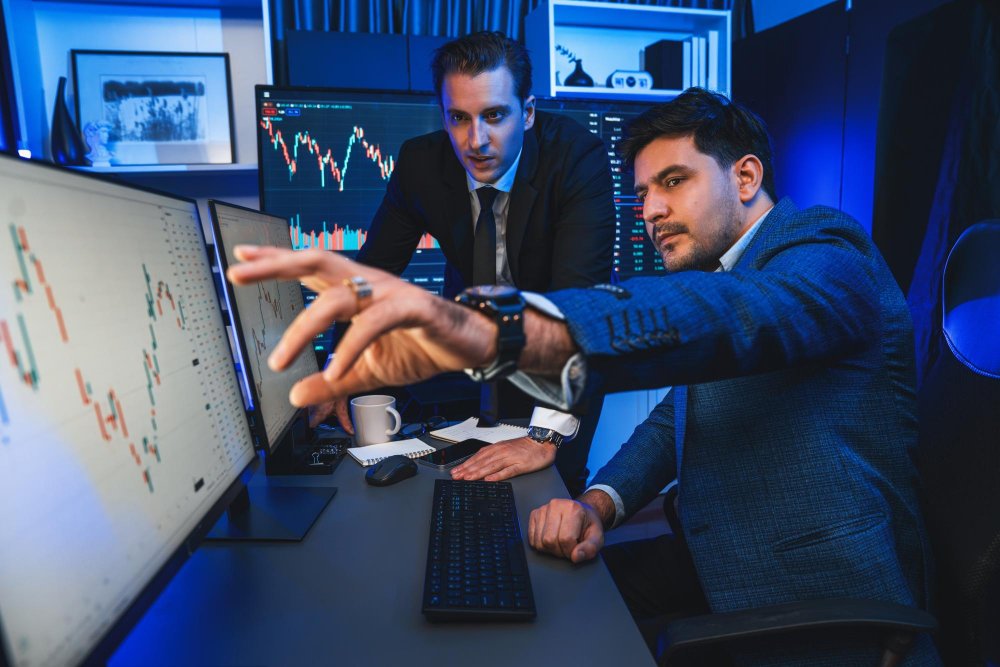 Market analysts reviewing sugar price data
